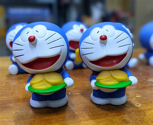 Mua bán PVC DORAEMON CẦM BÁNH RÁN NO BOX